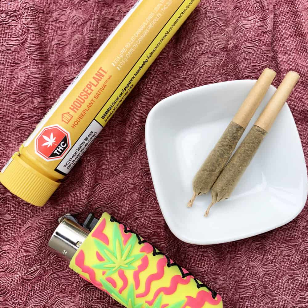 Filling custom pre-roll packaging with cannabis flower