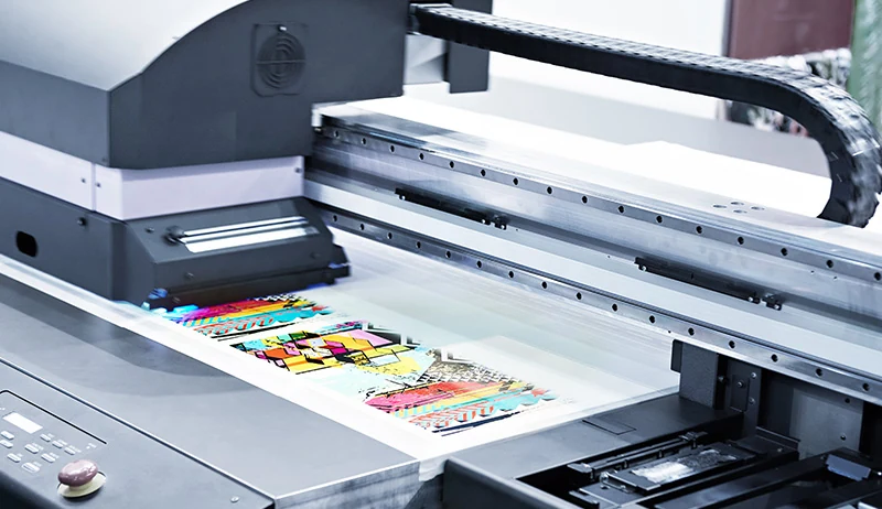 Offset printing press running custom packaging artwork