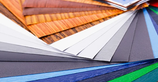 Macro close up of paperboard texture and foil finish